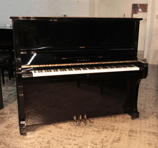Piano for sale. Reconditioned, 1972, Kawai BL-61 upright piano with a black gloss case. Piano has an eighty-eight note keyboard and three pedals. 