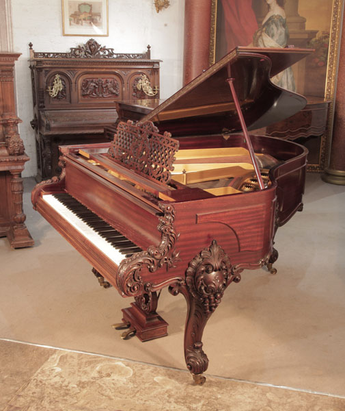 Rococo Style, 1900, Schiedmayer grand piano for sale with a  mahogany case and carved cabriole legs. Piano has an eighty-five note keyboard and a two-pedal lyre. Piano has an eighty-five note keyboard and a two-pedal lyre.