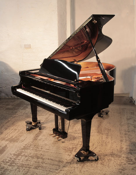 As new, 1924,   Shigeru Kawai SK-2      grand piano for sale with a black gloss case. Piano has an eighty-eight note keyboard and a three-pedal lyre.