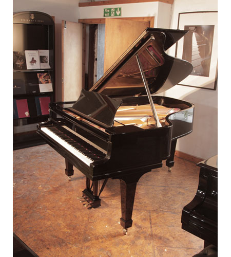 Restored 1916, Steinway Model A grand piano with a with a black case and spade legs. Piano has an eighty-eight note keyboard and a two-pedal lyre.
