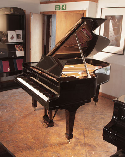 Restored,  1916, Steinway Model A grand piano with a with a black case and spade legs. Piano has an eighty-eight note keyboard and a three-pedal lyre.