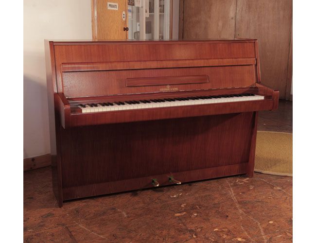 Reconditoned 1968, Steinway Model F upright piano for sale with a walnut case and brass fittings.