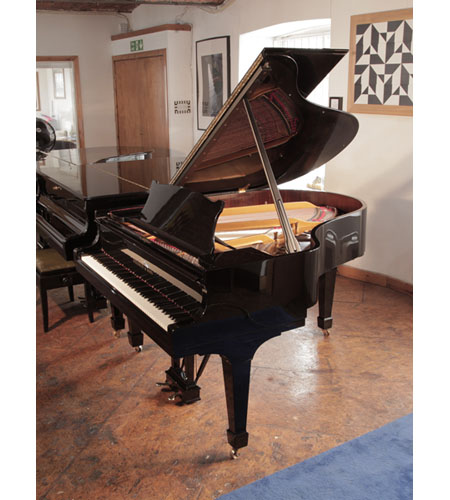 Restored,  1961, Steinway Model M grand piano with a black gloss case and spade legs.  Piano has an eighty-eight note keyboard and a two-pedal lyre.  