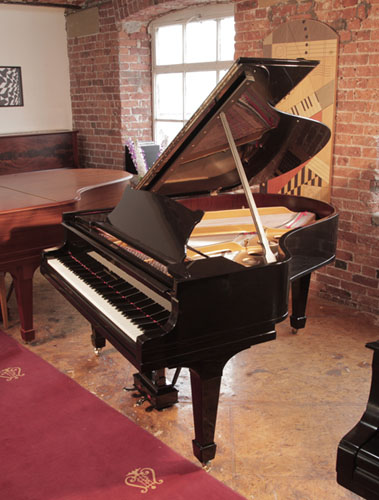 RRebuilt, 1925, Steinway Model O grand piano with a with a black case. Piano has an eighty-eight note keyboard and a two-pedal lyre.   