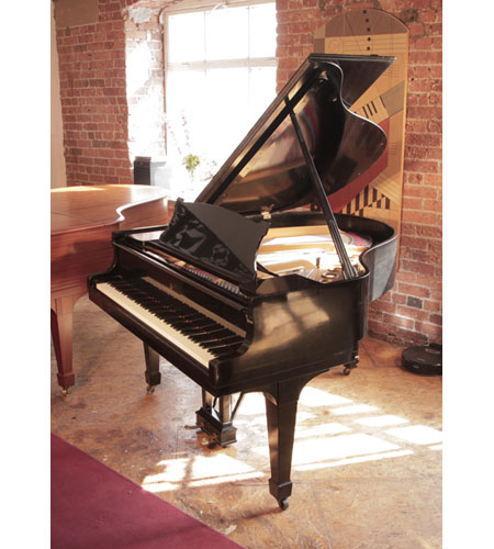 Reconditioned 1925, Steinway Model S baby grand piano for sale with a black case and spade legs. Piano has an eighty-eight note keyboard and a two-pedal lyre. 