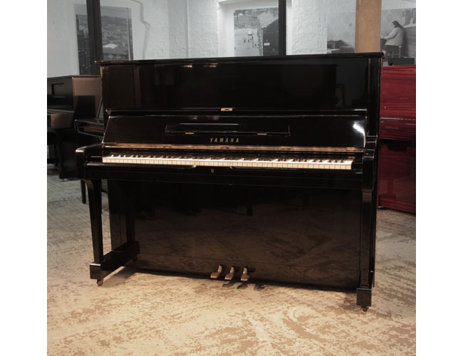 Reconditioned, 1973, Yamaha U1 upright piano with a black case and polyester finish. Piano has an eighty-eight note keyboard and three pedals. Price includes: 3 year warranty  |   Free delivery to a ground floor residence within mainland UK Reconditioned, 1973, Yamaha U1 upright piano with a black case and polyester finish. Piano has an eighty-eight note keyboard and three pedals.