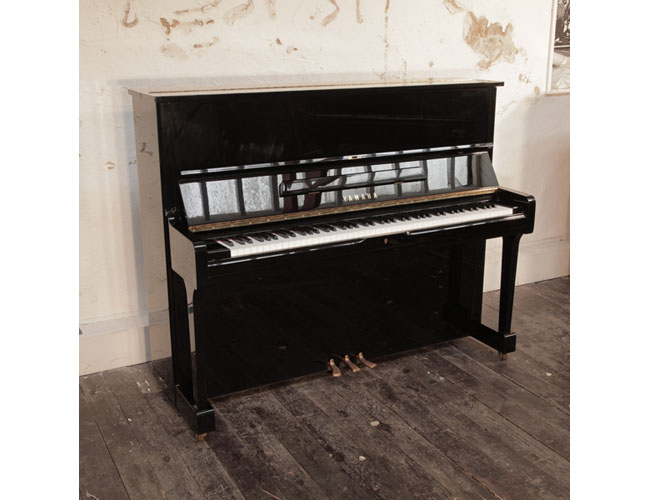 Reconditioned,  1994, Yamaha U1 upright piano for sale with a black case and brass fittings