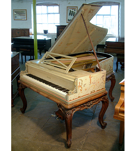 An 1893, Pleyel grand piano hand-painted with a fairies, satyrs, nudes, monkeys, mythical creatures, birds, flowers and crested composers names. Signed by G. Meunier